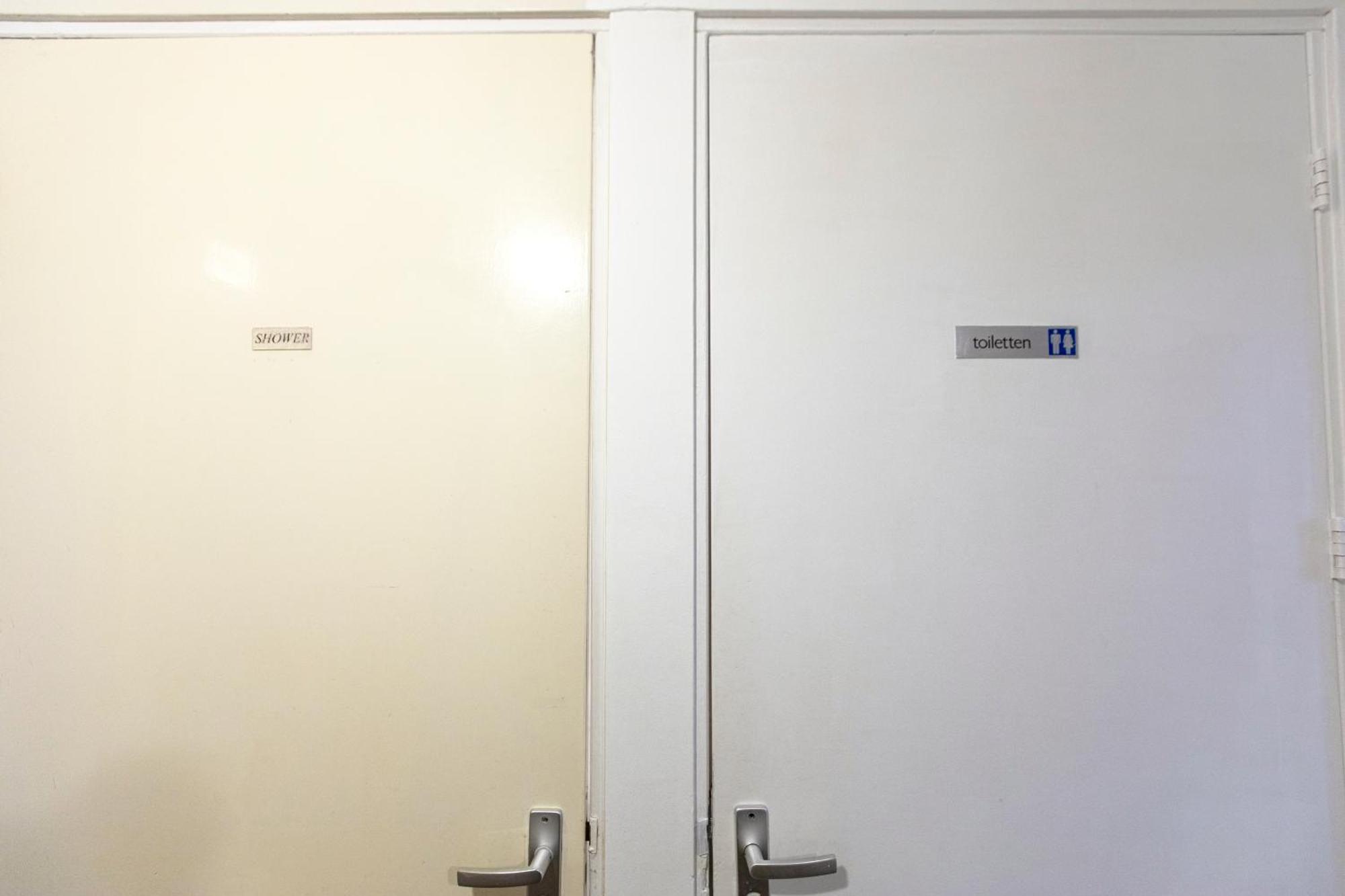 Quarto Triplo com Banheiro Compartilhado