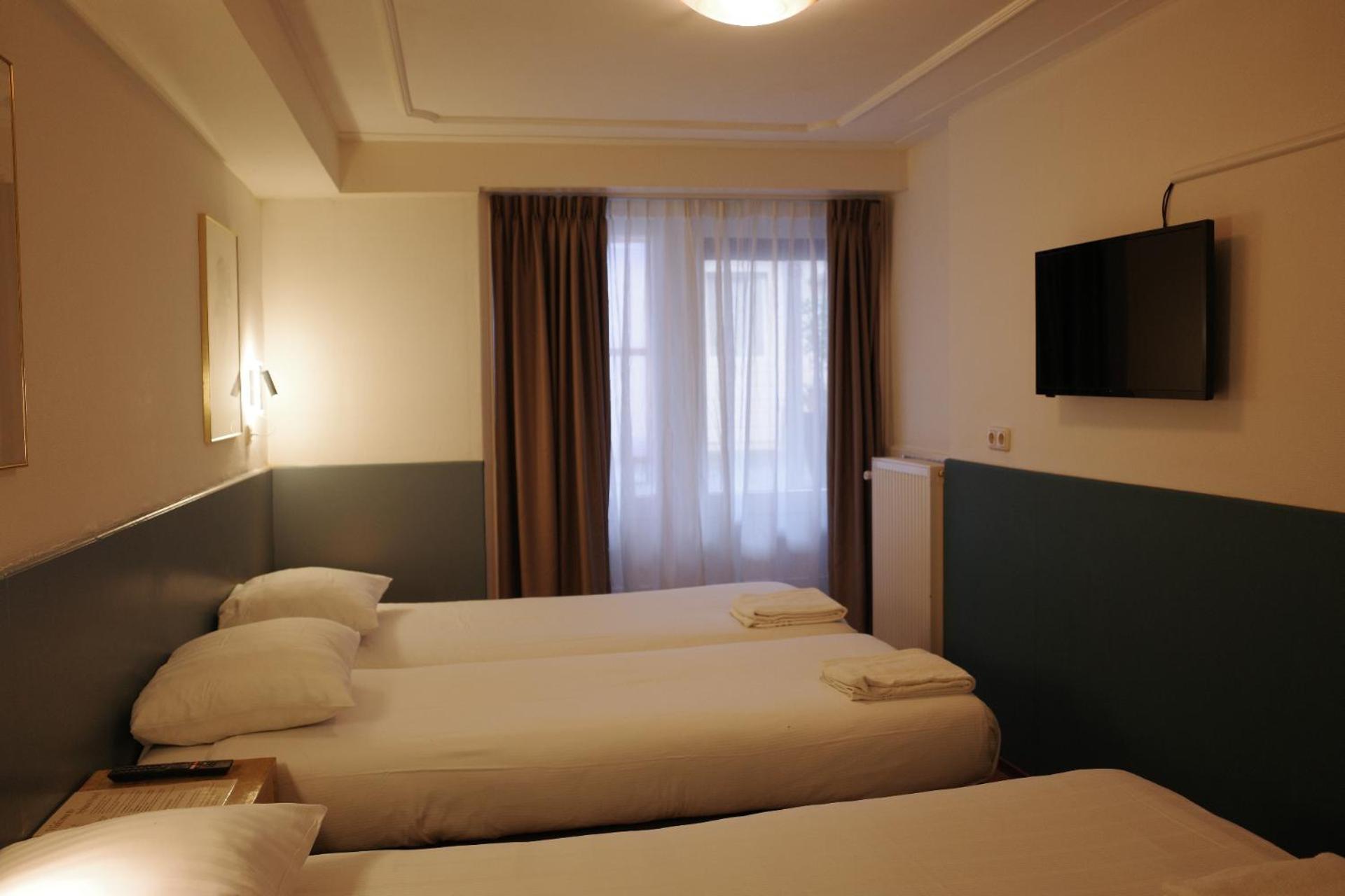 Chambre Triple avec Salle de Bains Privative