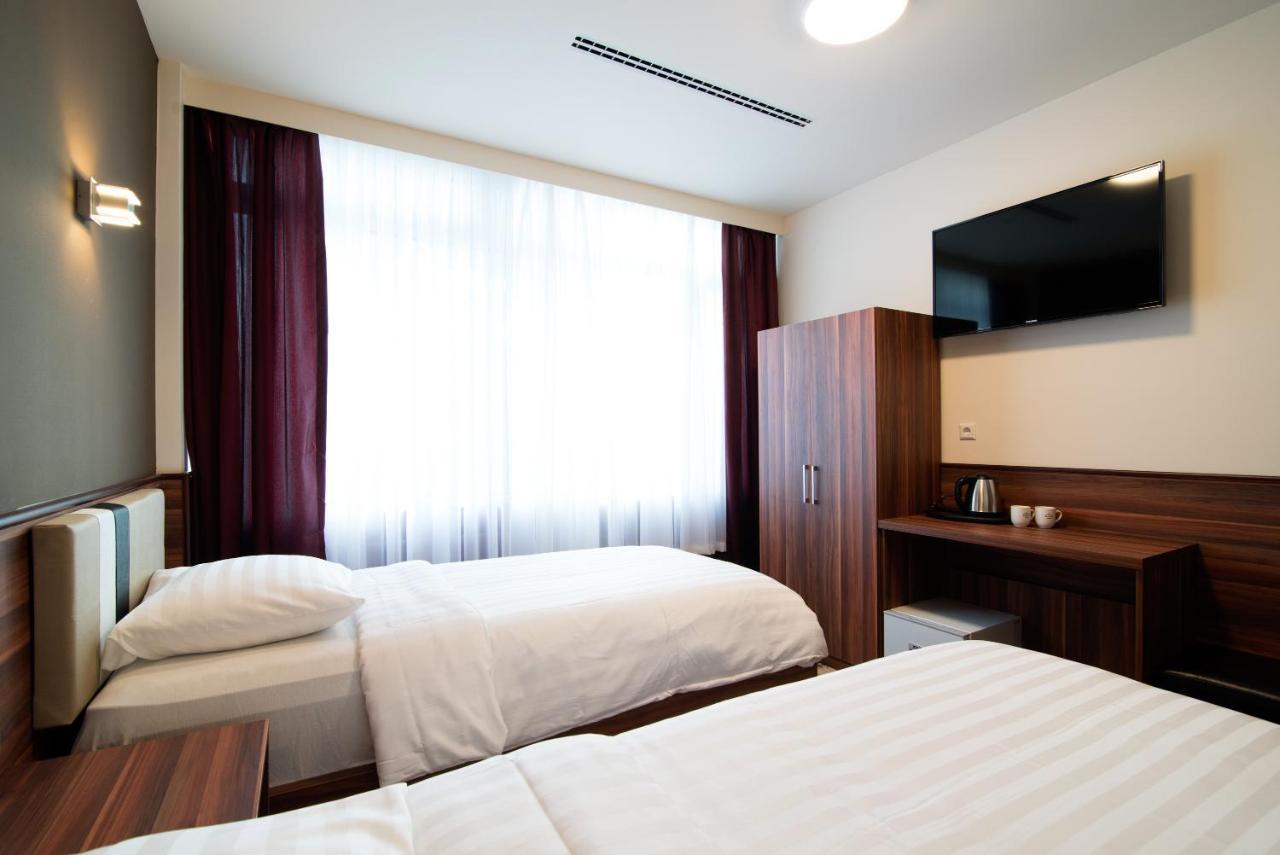 Quarto Comfort com 2 Camas de Solteiro